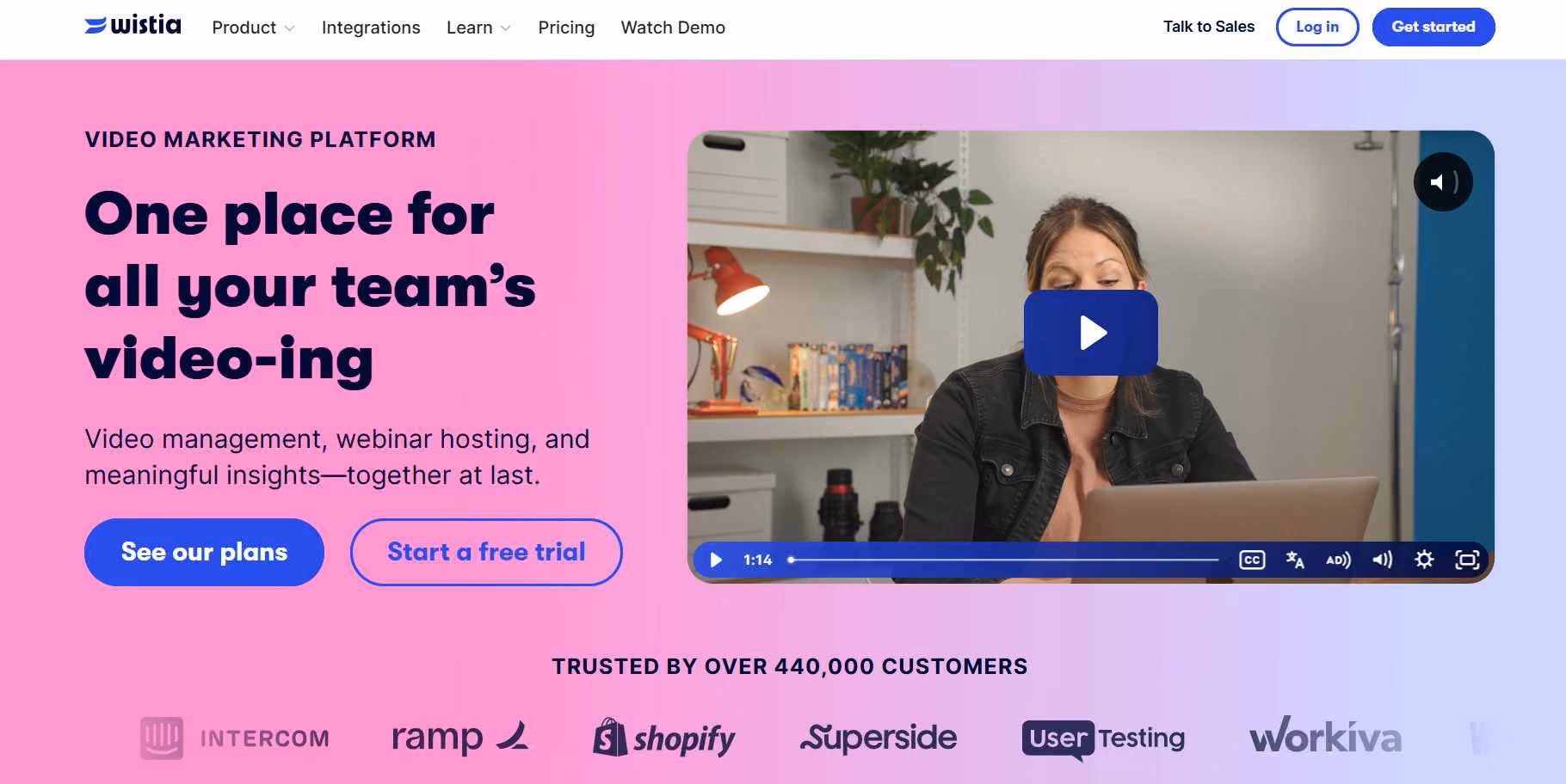 Wistia video marketing platform landing page with a woman presenting and a "Start a free trial" button