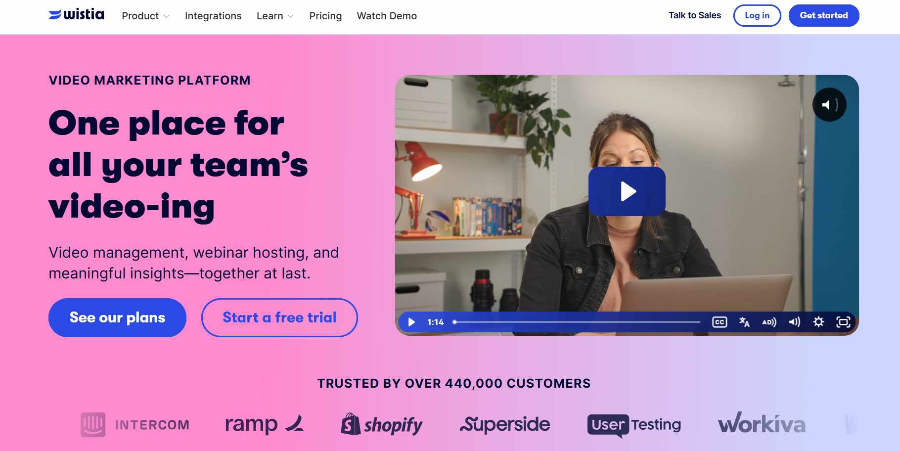 Wistia video marketing platform landing page with a woman presenting and a "Start a free trial" button