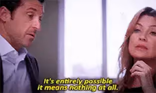A man and woman in a scene from Grey's Anatomy with the caption 'It's entirely possible it means nothing at all