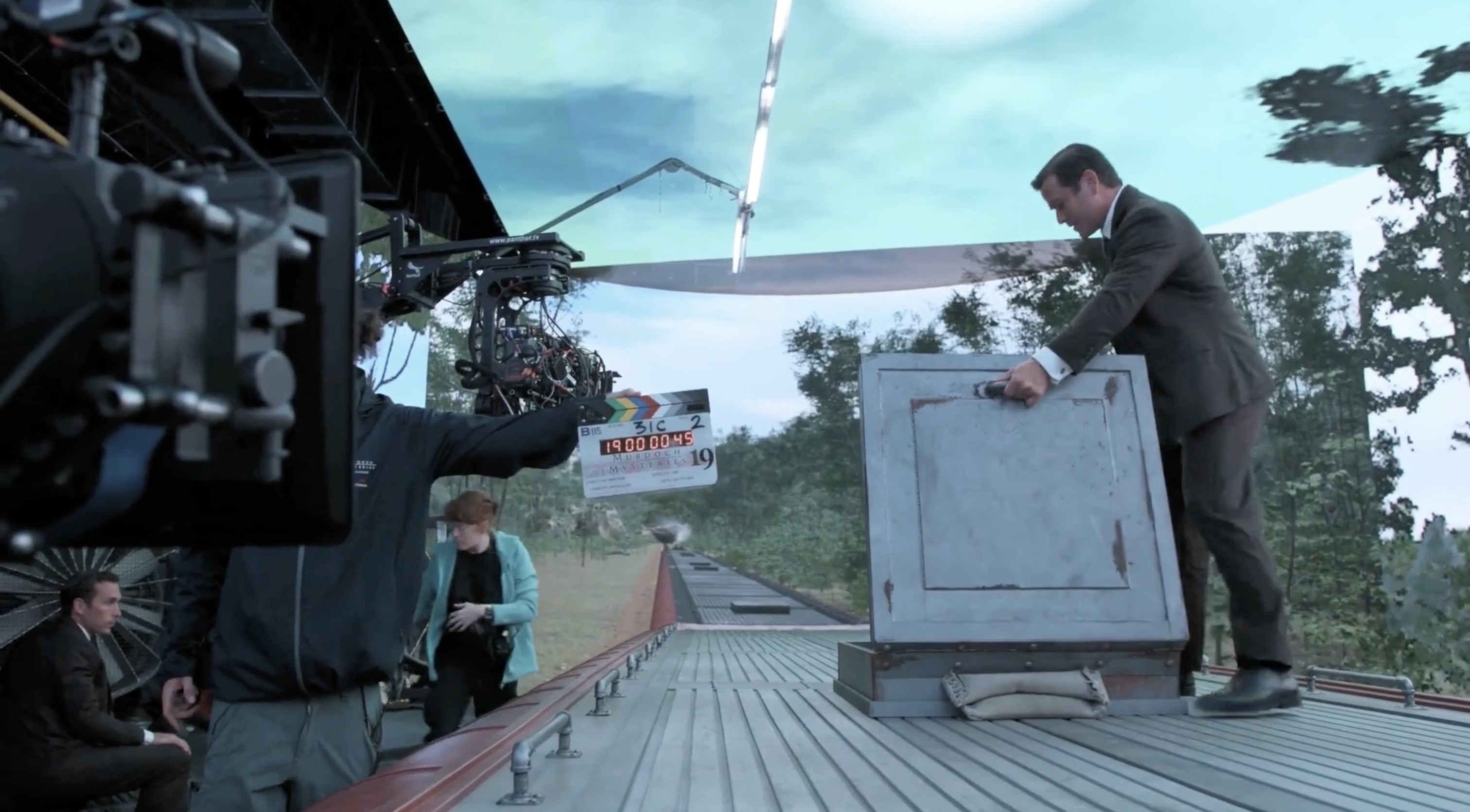 Shooting Murdoch Mysteries on an LED volume with a camera crane and clapper