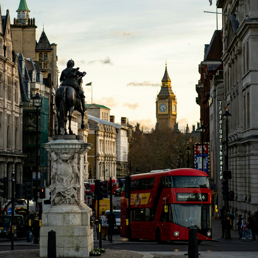 A photo of looking down a very busy Whitehall in central London.