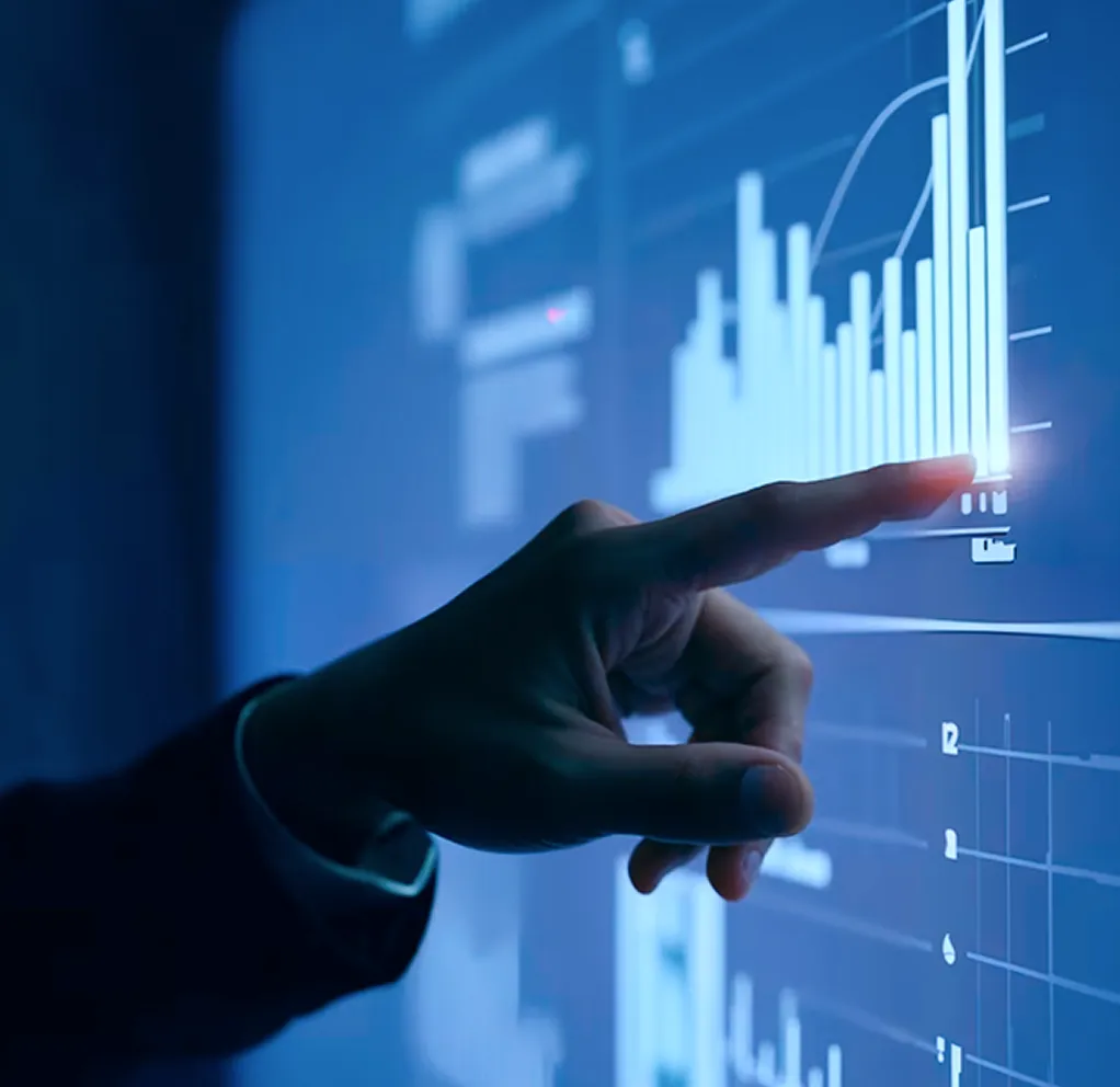 Hand interacting with data chart on digital screen
