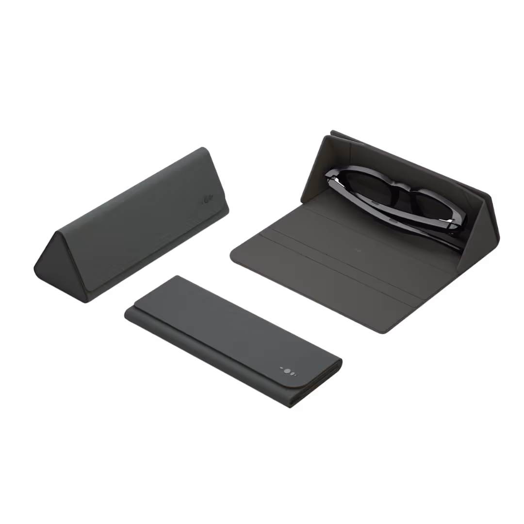 Foldable eyeglass case open with glasses inside, accompanied by two closed cases on the side.