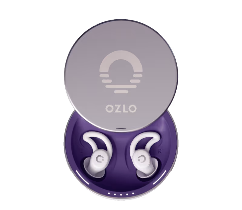 Open case showing a pair of white wireless earbuds with hooks inside a purple-lined container.
