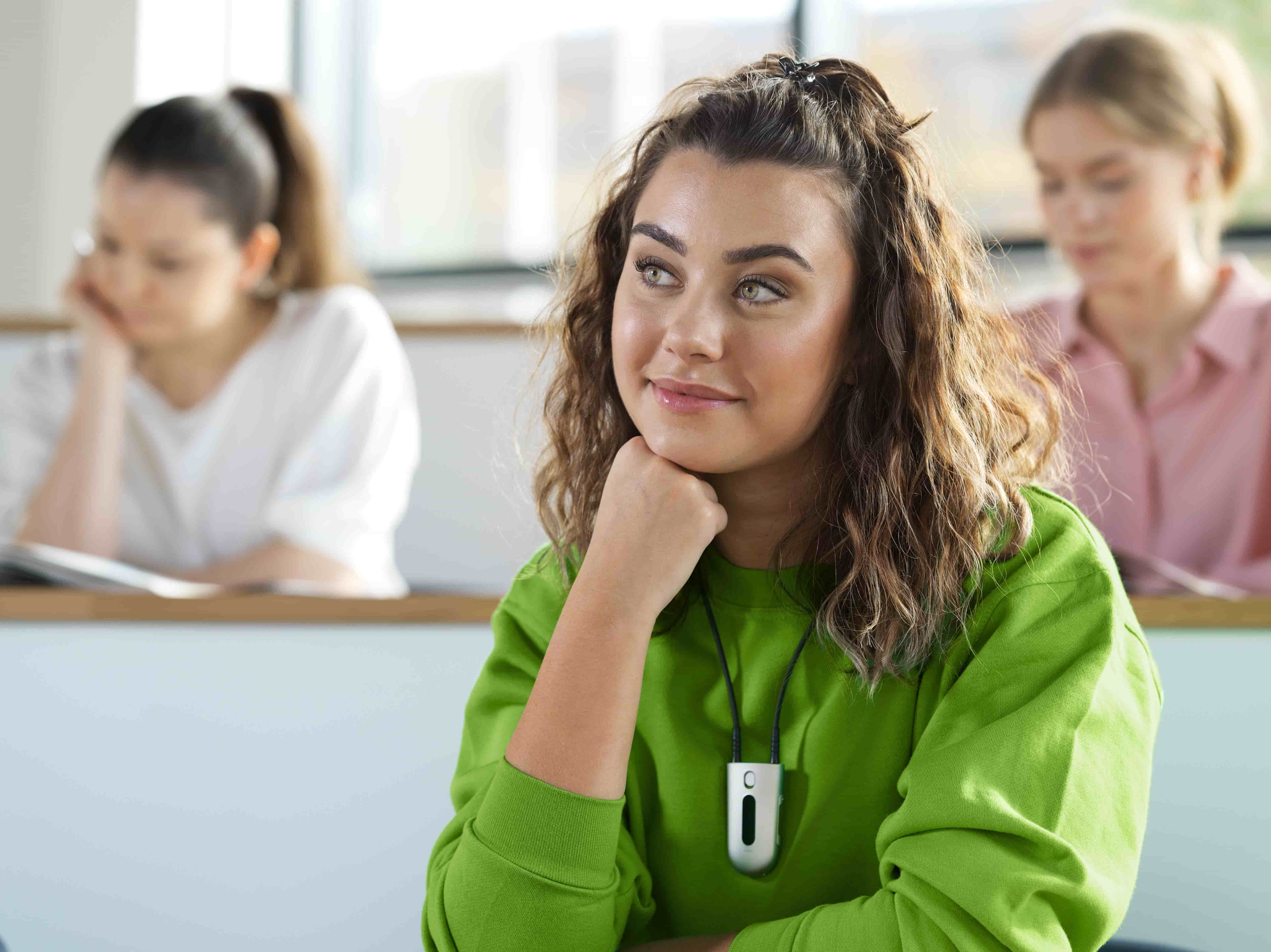 girl wearing Phonak Roger technology