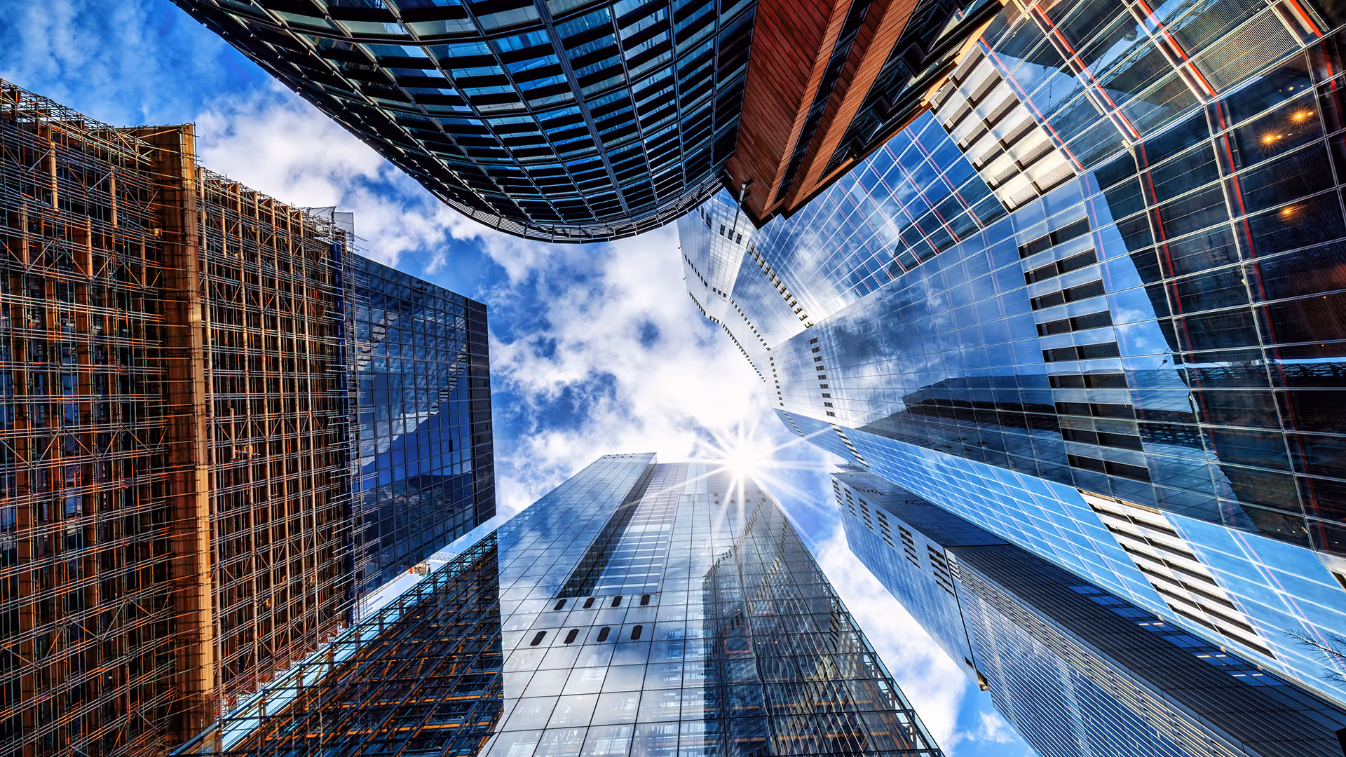 Skyscrapers in London's financial district, representing an imperfect market for acquirers