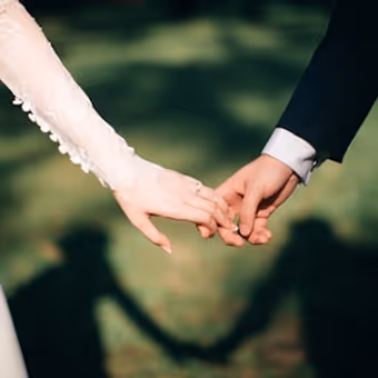 Image of people holding hands