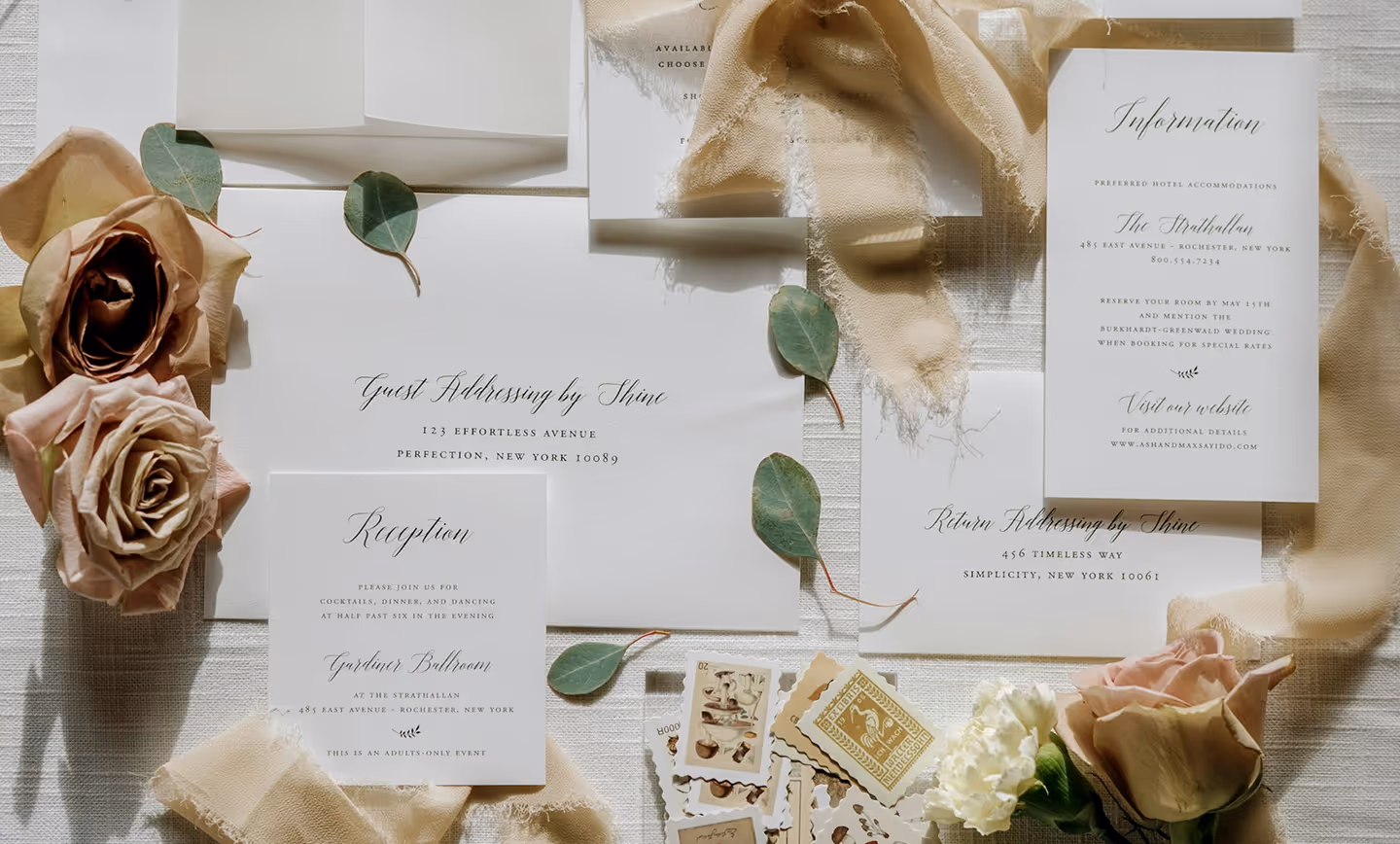 an image of paper invitations resting on table
