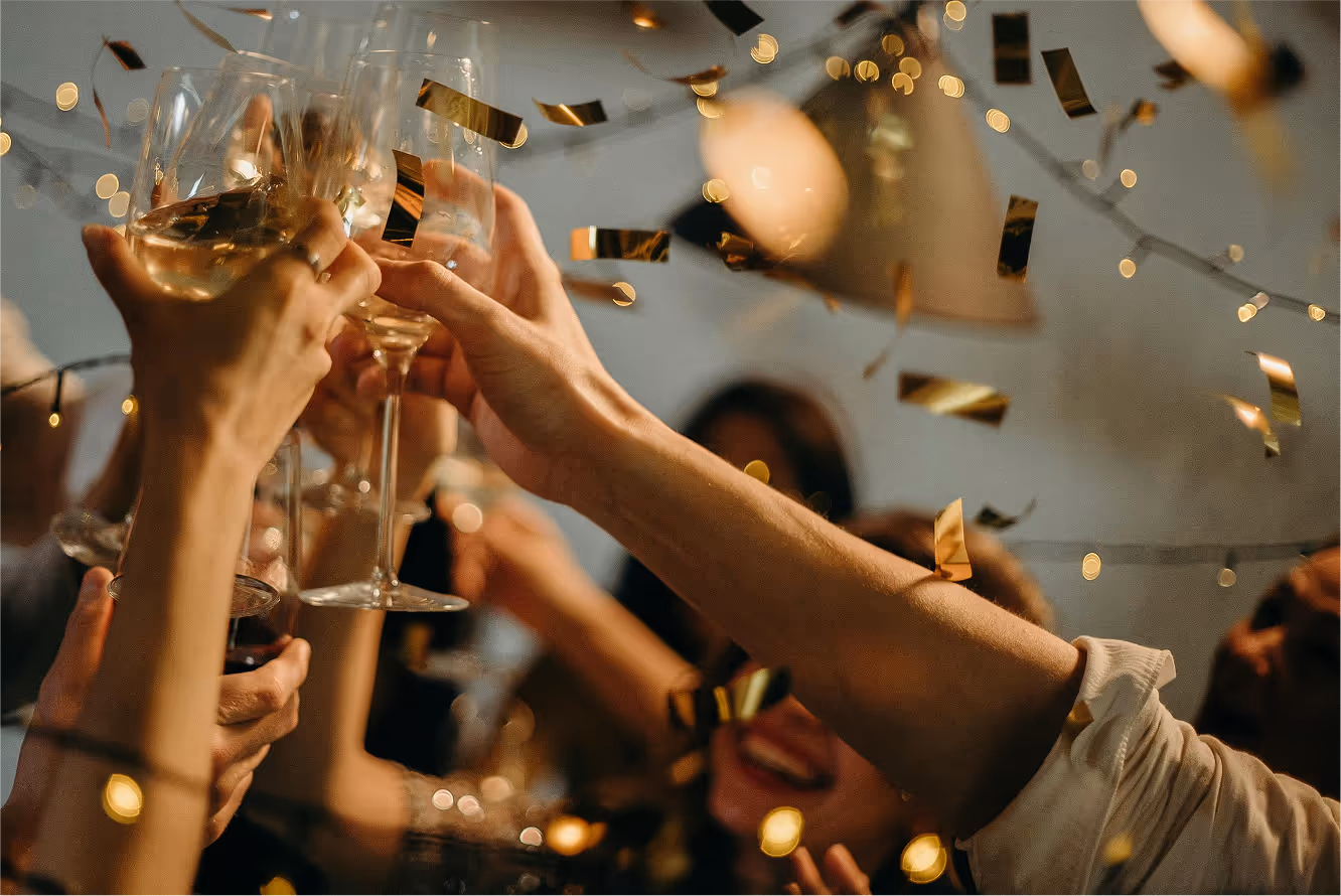 Party image of hands holding glasses