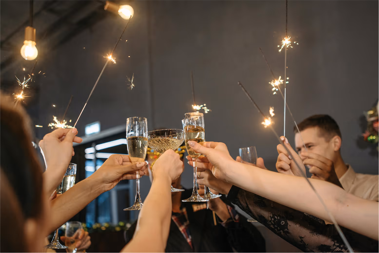 Image of people raising glassess