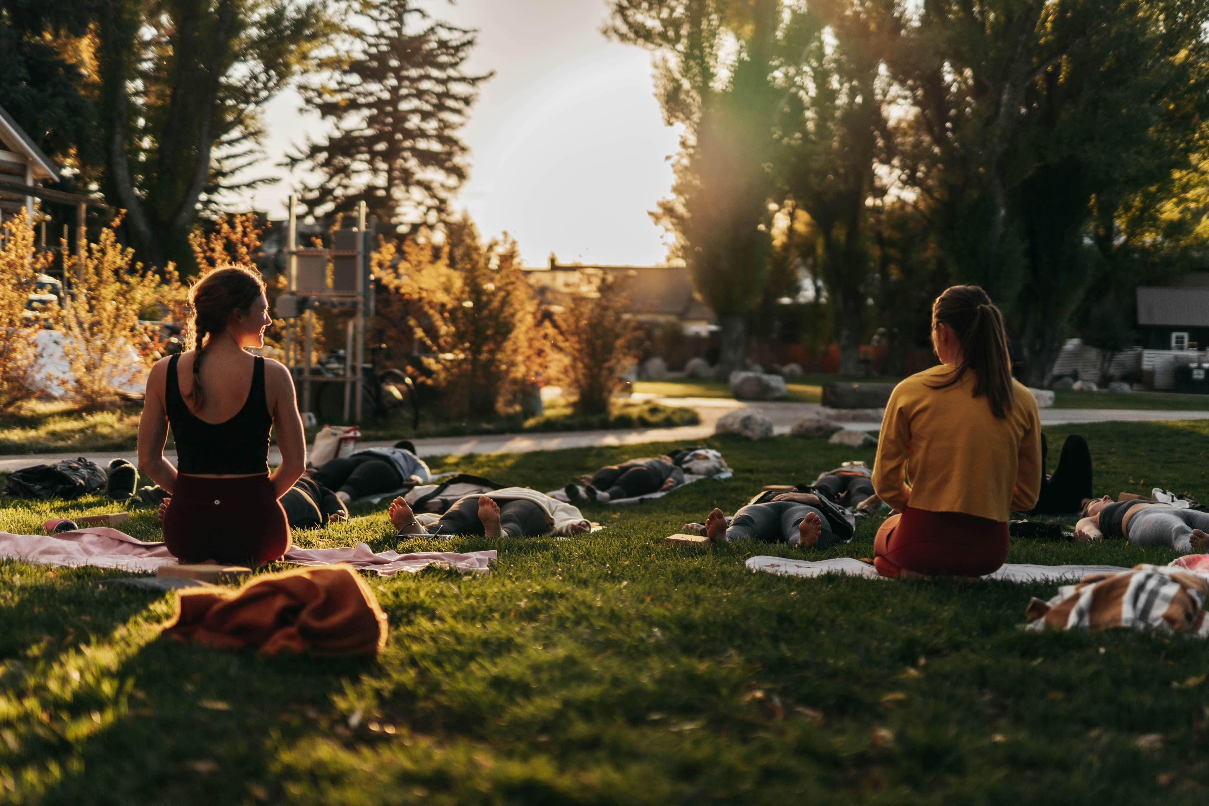 People relaxing on grass
