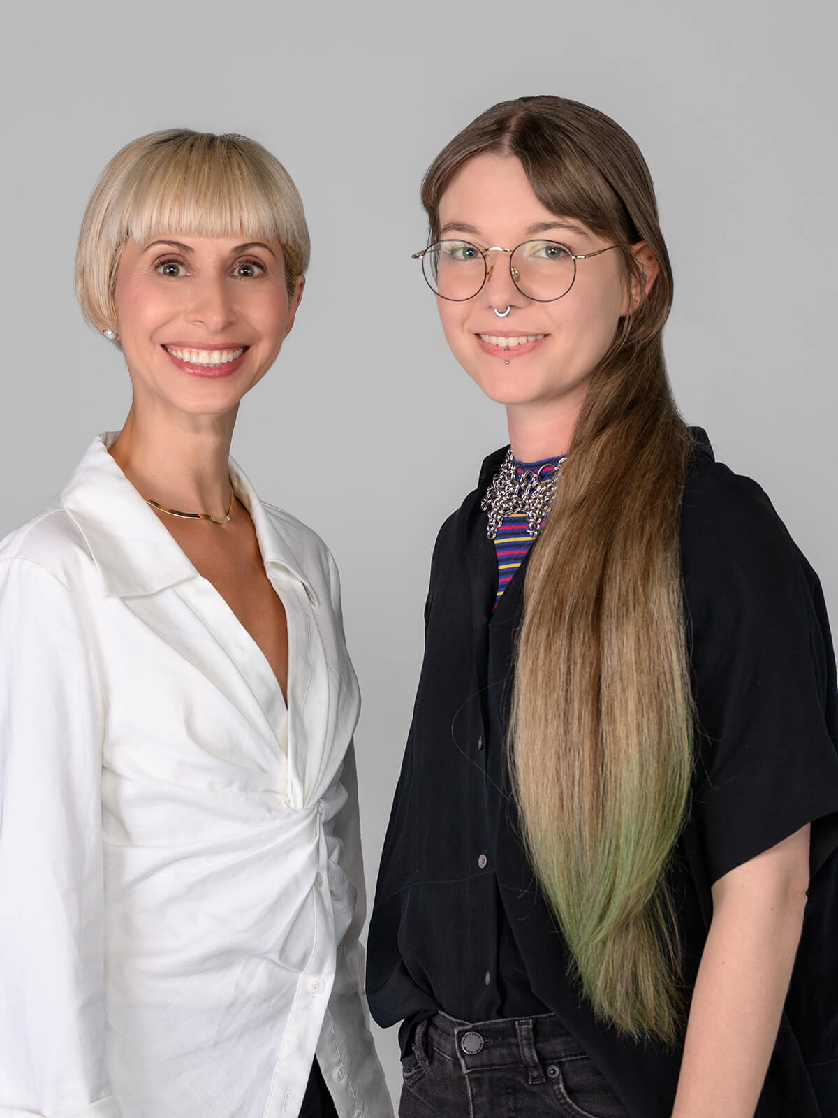 Dr Lena and a patient smiling after successful MARPE and Invisalign treatment