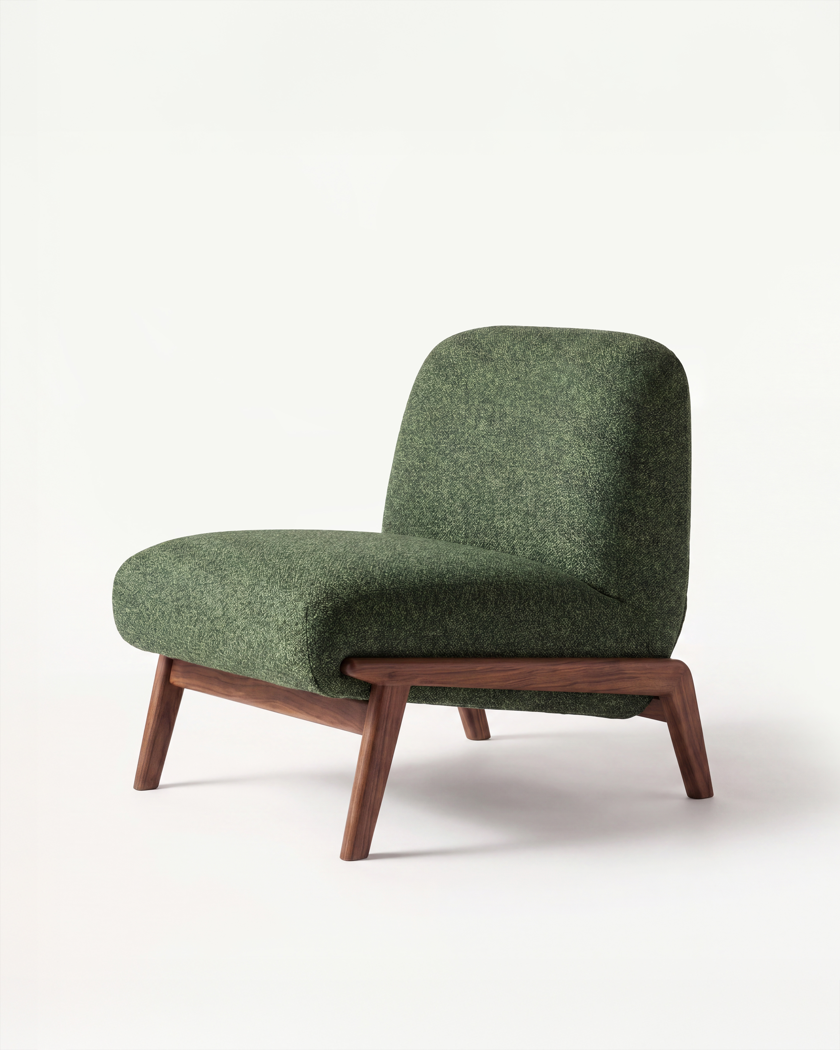 Camilla low chair in green fabric with a walnut frame