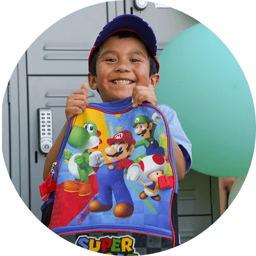 kid with mario tshirt