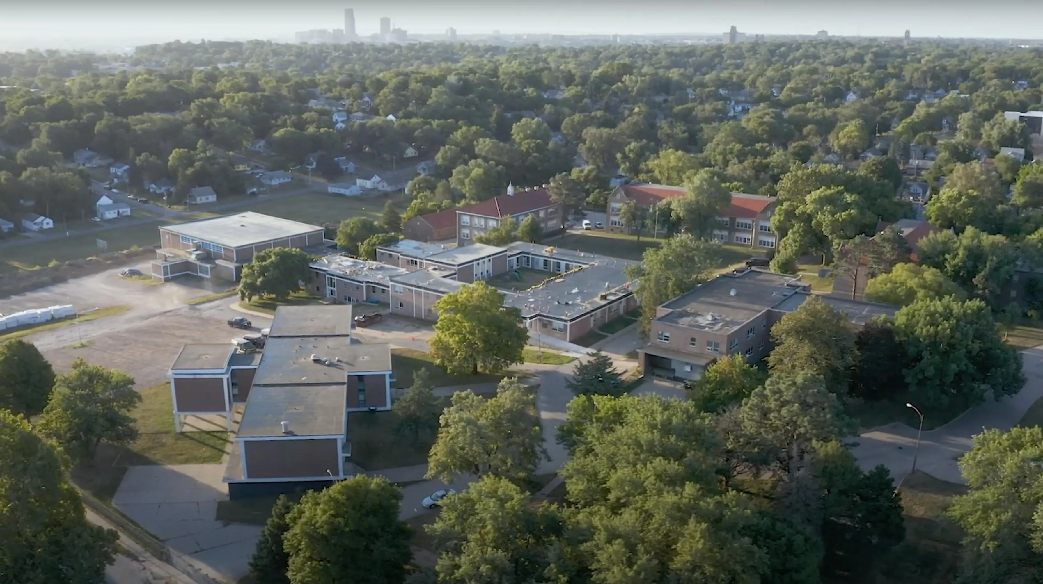 An aerial view of a city with lots of trees.