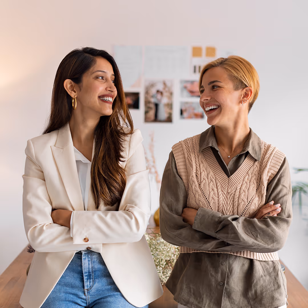 two female therapists laughing together. Supervision at Therapy Academy in Frisco TX
