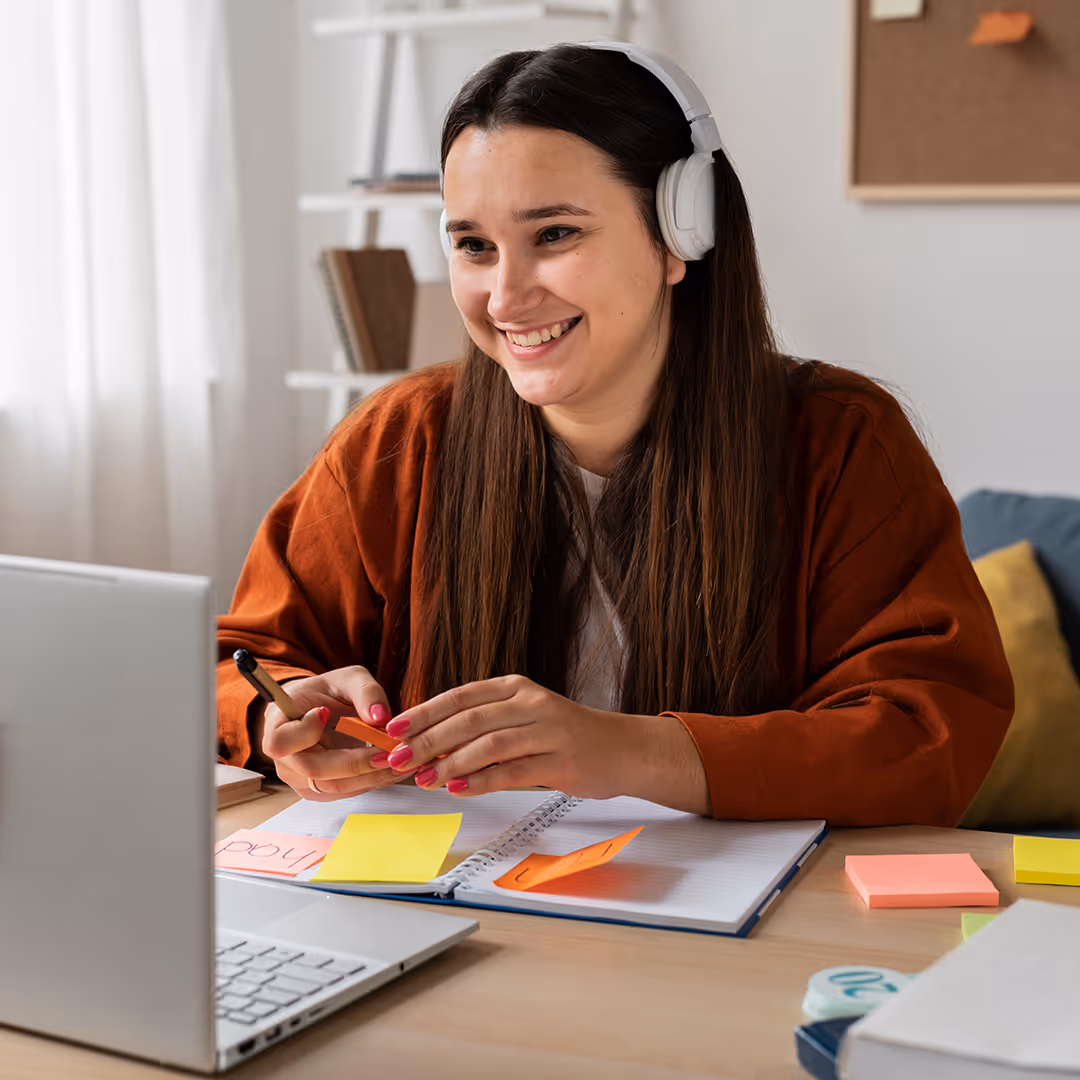 happy female therapist receiving ceu online trainings from therapy academy in frisco tx