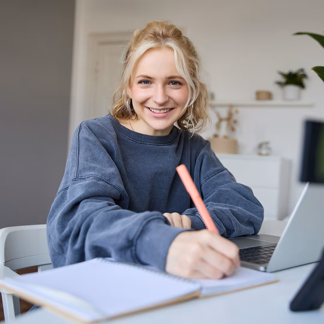 happy female therapist receiving ceu online trainings from therapy academy in frisco tx