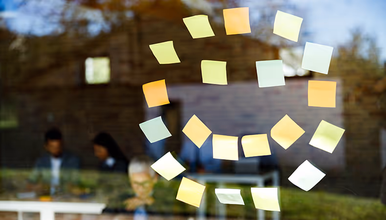Photo of sticky notes on a wall