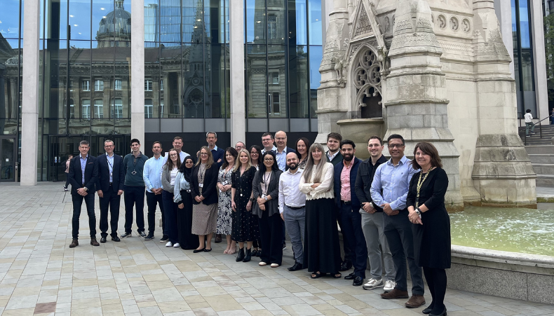 TLT Birmingham team stood outside the office