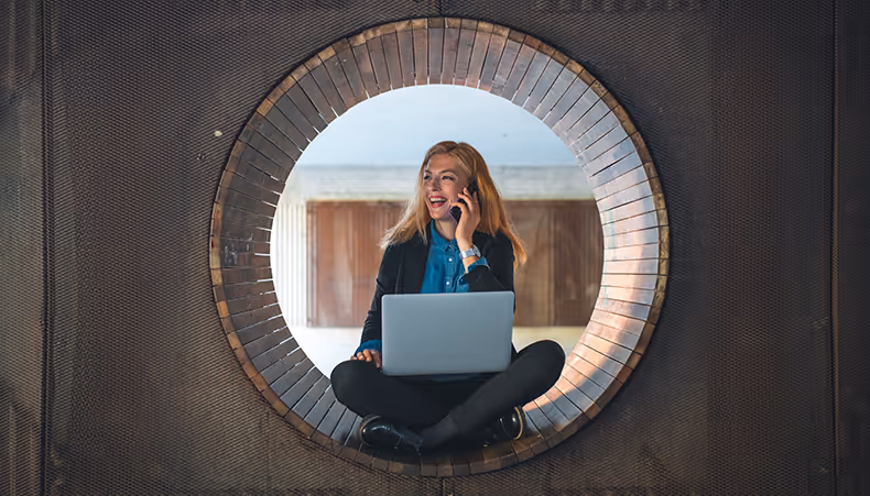 Photo of woman working at home