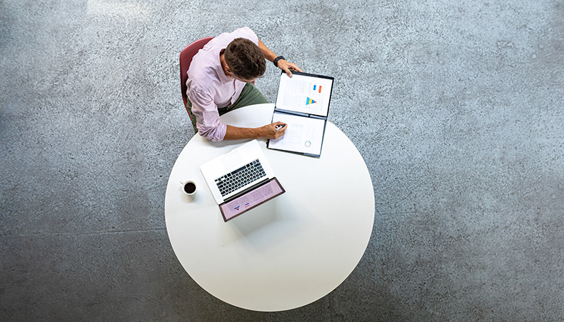 Man working at round table