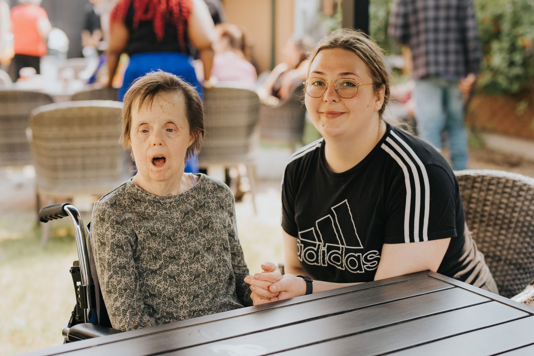 photo of a director giving instructions to actors on a film set
