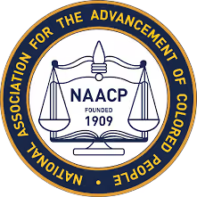 NAACP seal with scales of justice and text 'Founded 1909' inside a blue and gold circle.