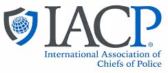 Logo of International Association of Chiefs of Police with a shield and globe icon.