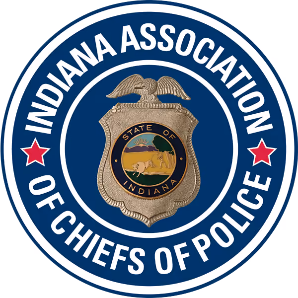 Badge with eagle and Indiana state seal inside blue circle reading Indiana Association of Chiefs of Police.
