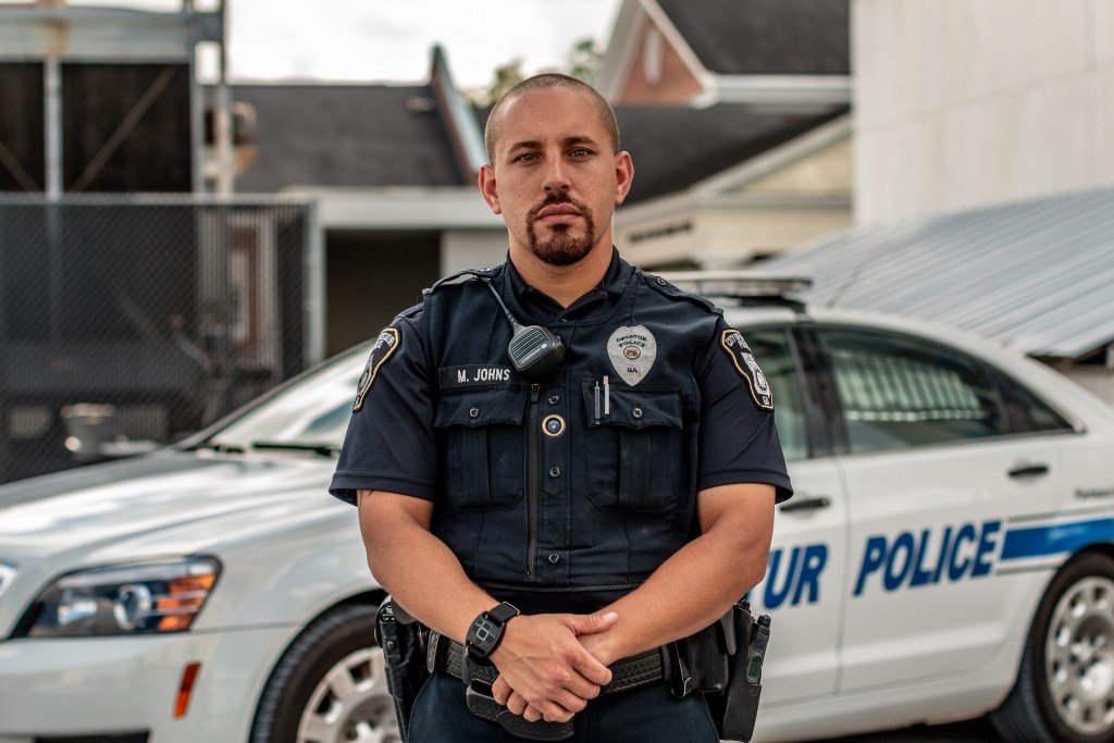police officer wearing bodyworn by utility