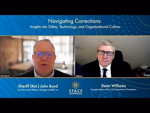 Two men in suits and glasses in a virtual meeting titled Navigating Corrections on safety and technology.