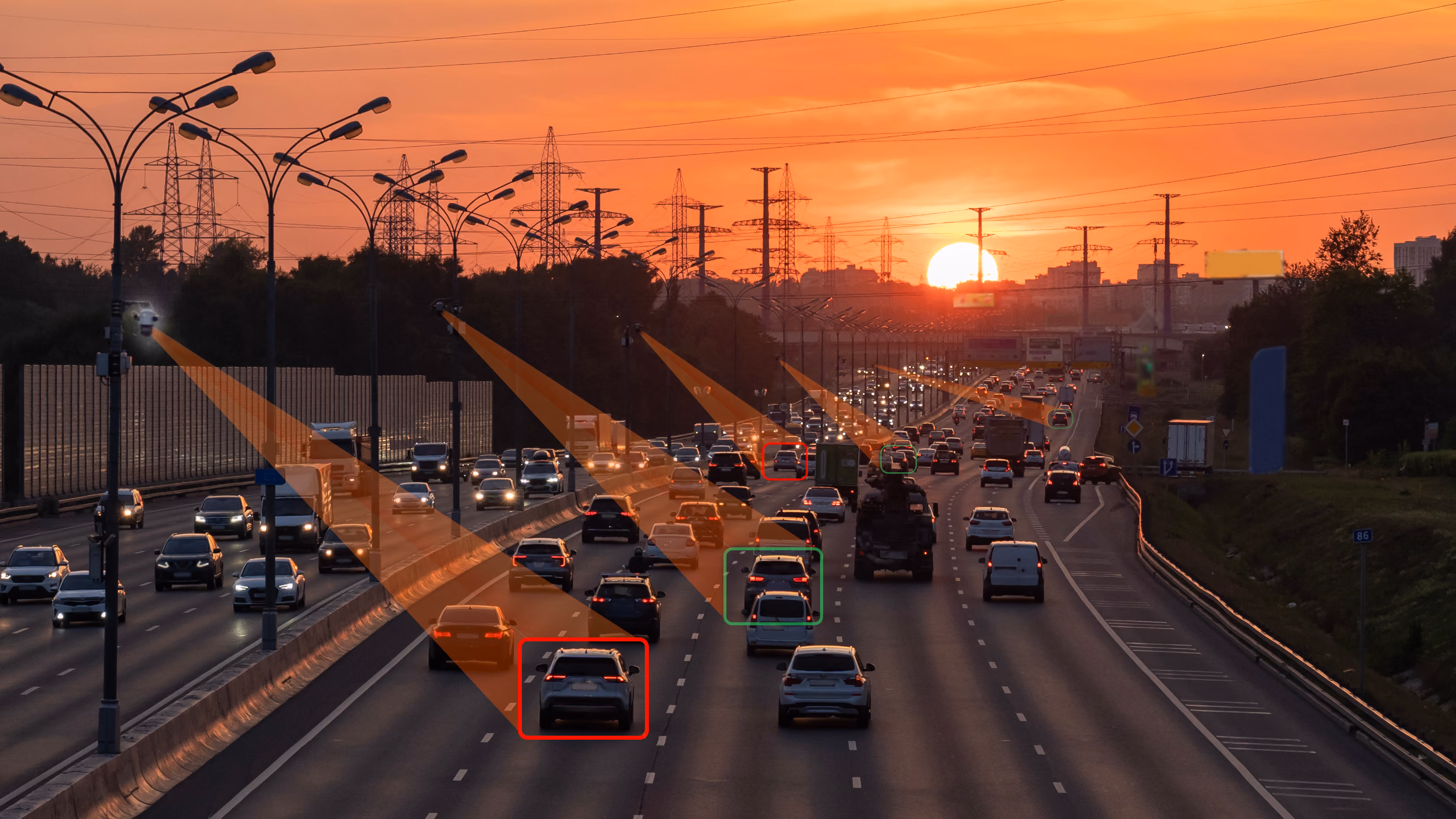 Highway traffic at sunset with vehicles detected and tracked by AI in red and green boxes with sensor beams.