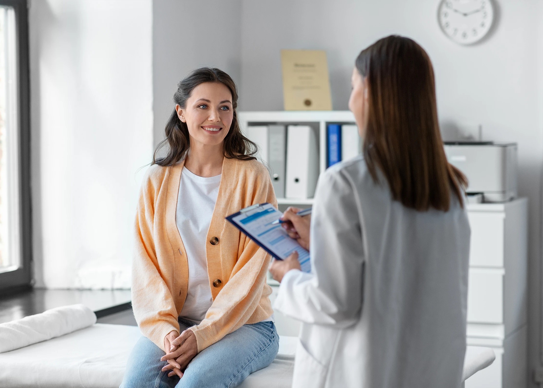 A doctor talking to a patient