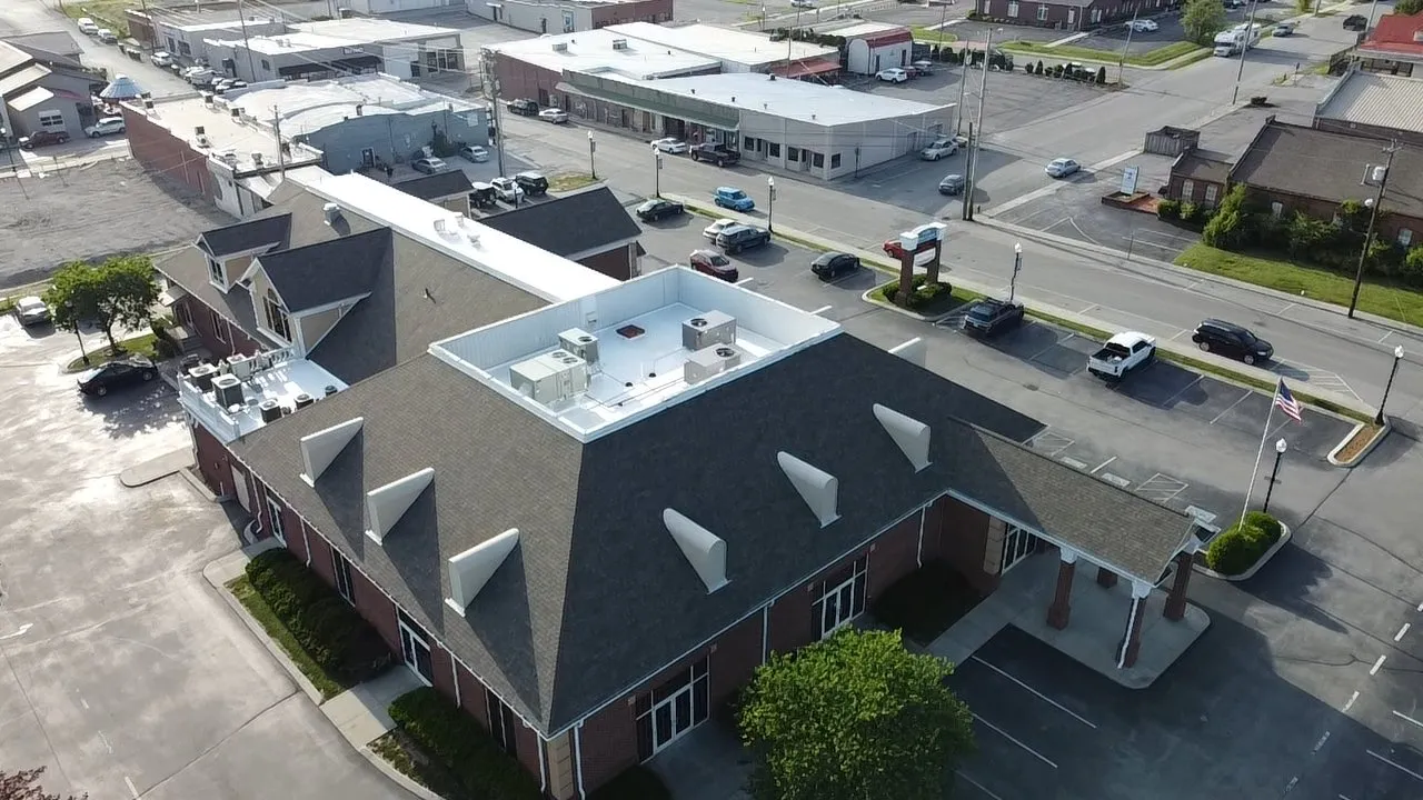 Commercial roofing project showcasing energy-efficient flat roofing materials