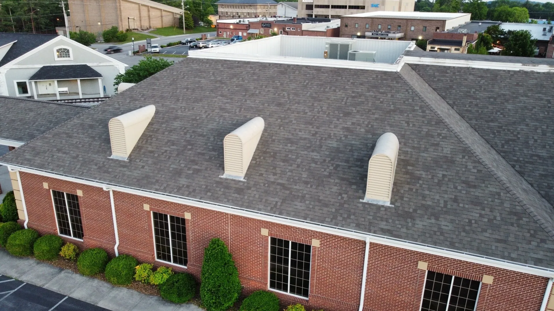 Completed flat commercial roof project showing clean lines and durable surface