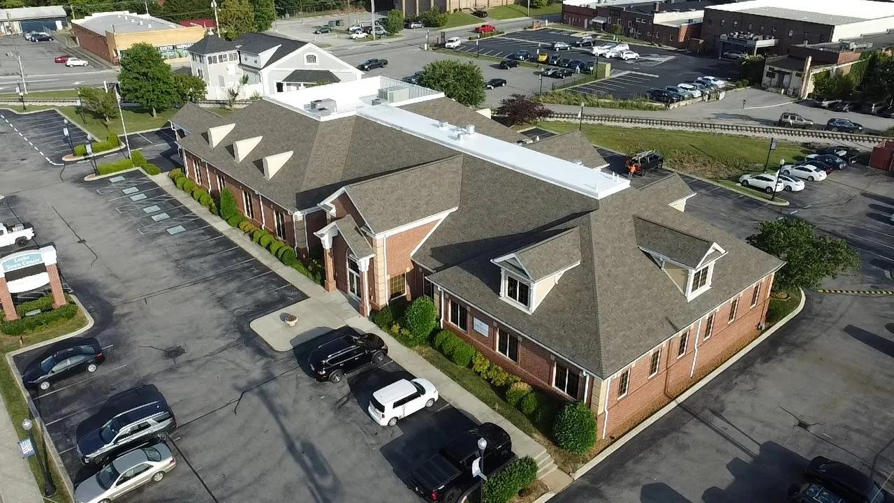 Large-scale commercial building with professionally installed flat roof system