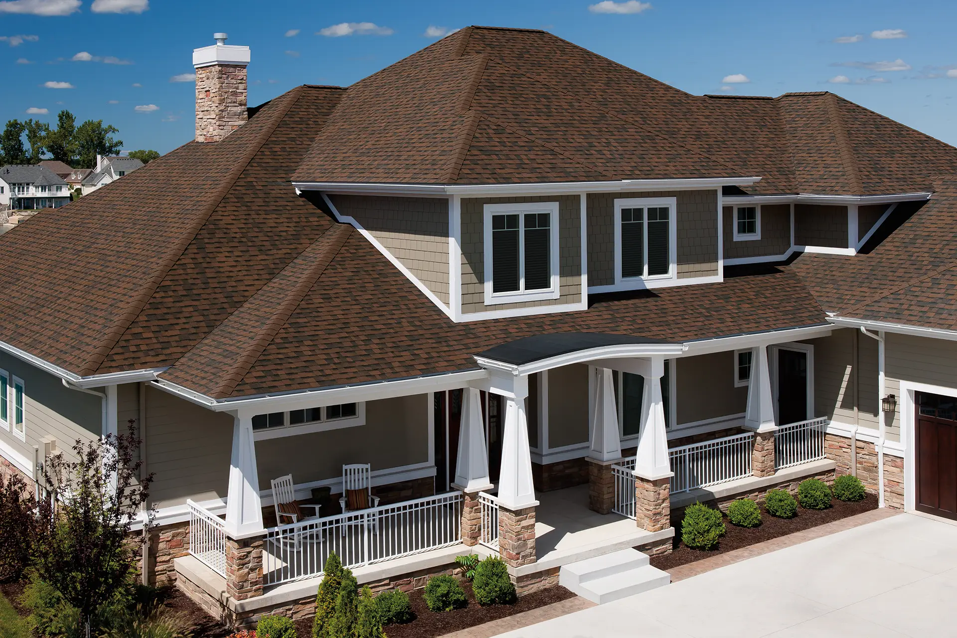 Owens Corning Brownwood shingles featured on a home roof
