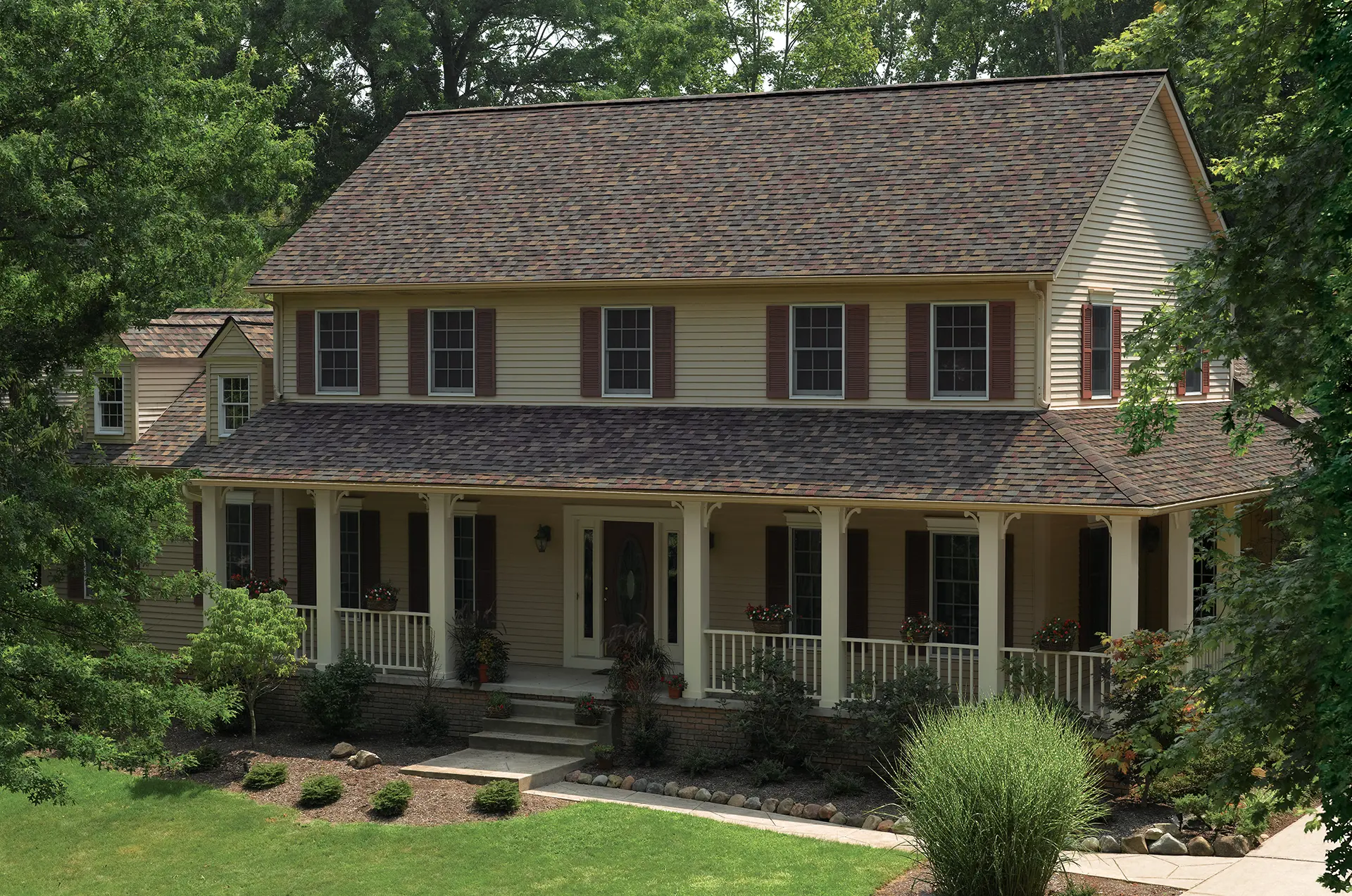 Summer Harvest shingles from Owens Corning shown on residential property