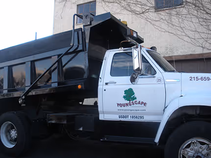 Youngscape truck with landscaping equipment