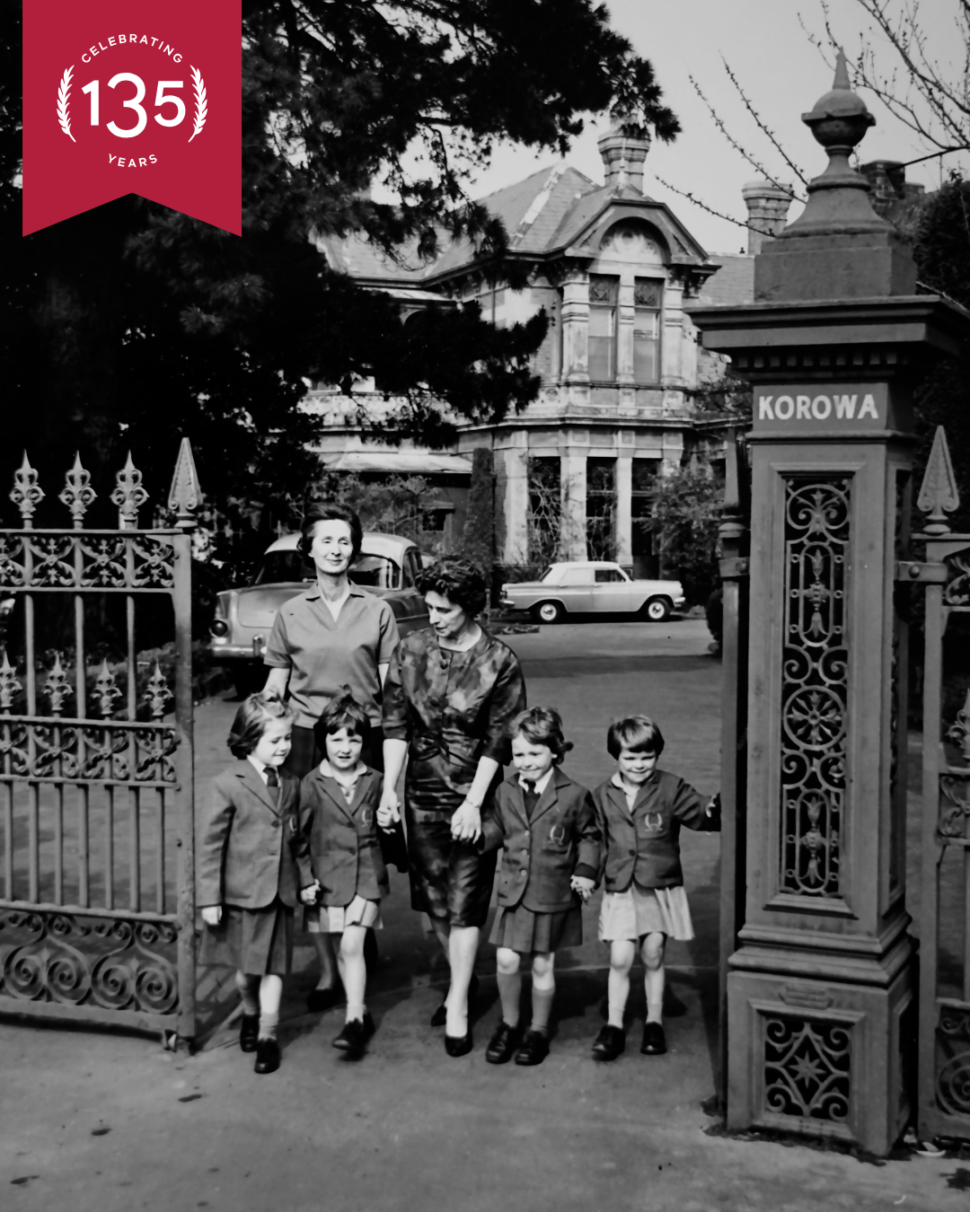 Beatrice K Guyett infront of Korowa girls' school with students
