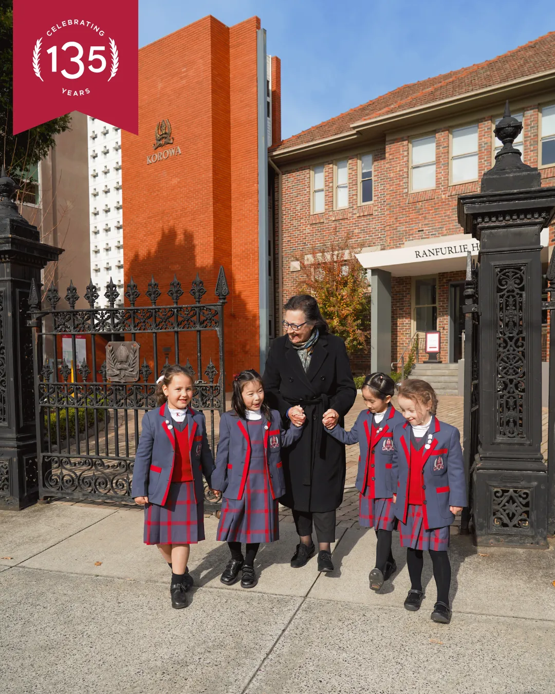Frances Booth principal outside of korowa with students