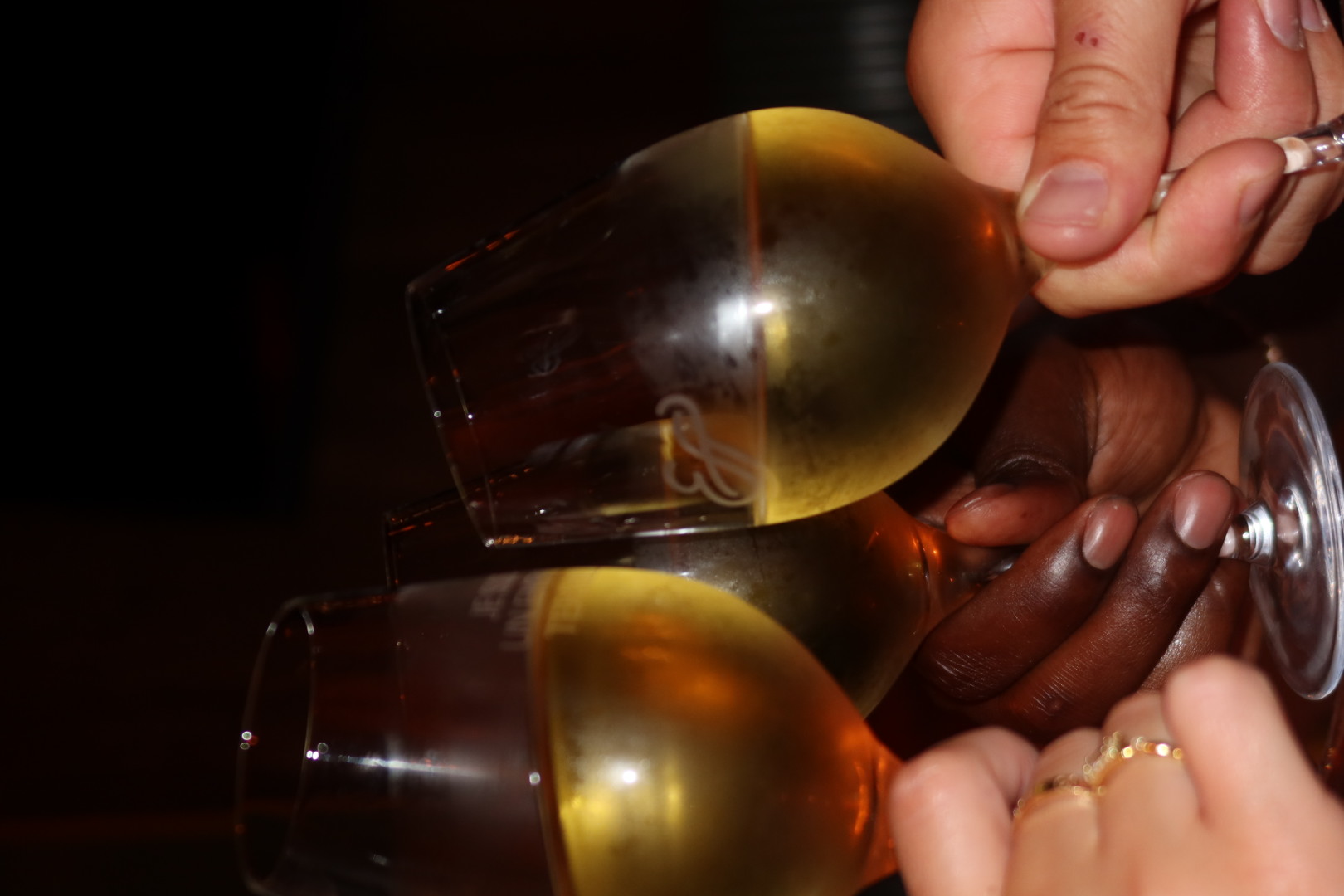 Close-up of wine glasses clinking at the One Way talents' dinner in Quebec City