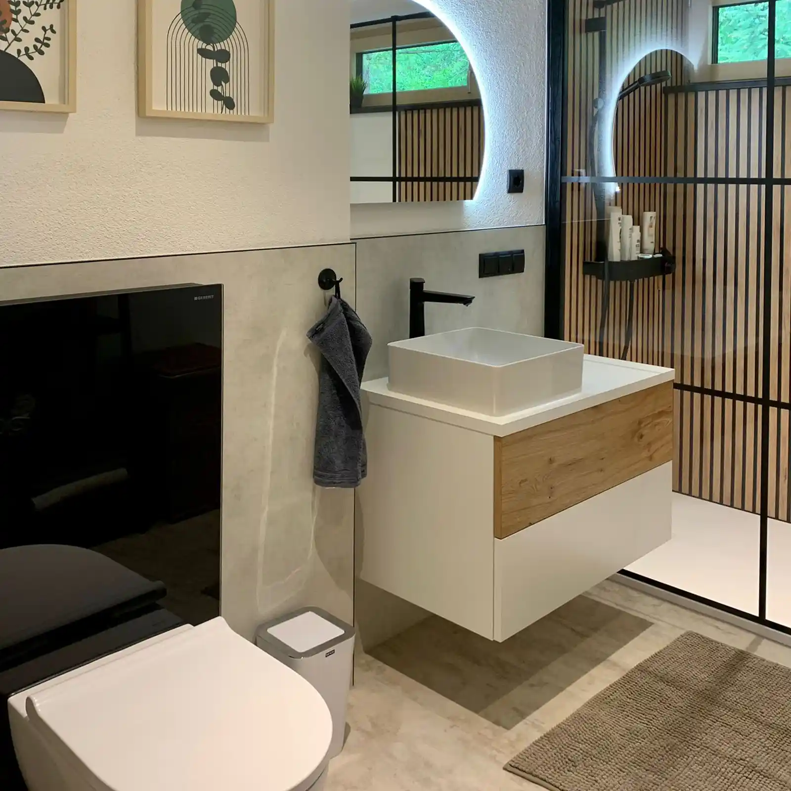 Badumbau Tirol – modernes Gäste-WC mit Waschtisch nach Badsanierung in Tirol