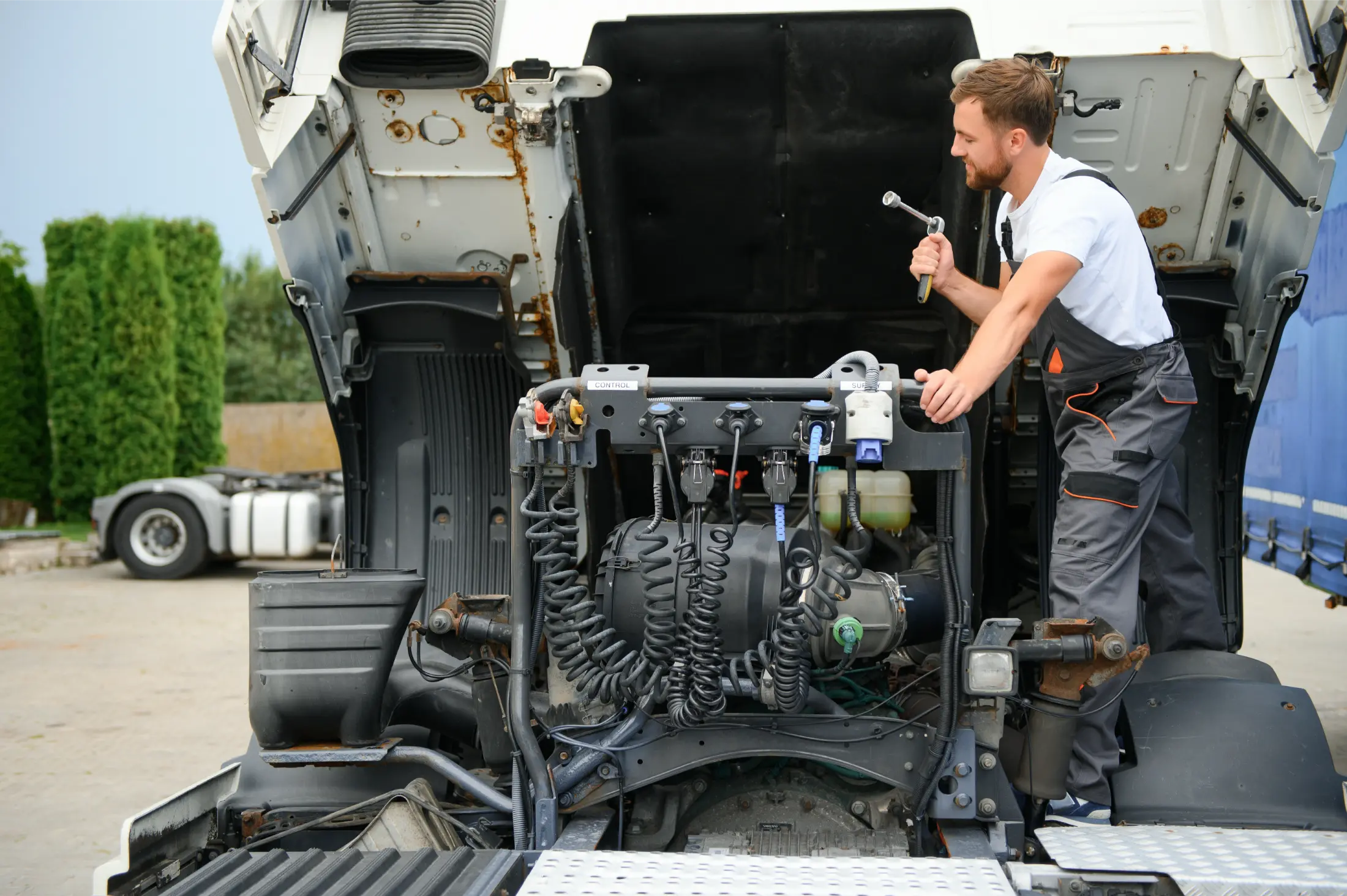 Mechanic performing truck preventive maintenance in Edmonton, AB