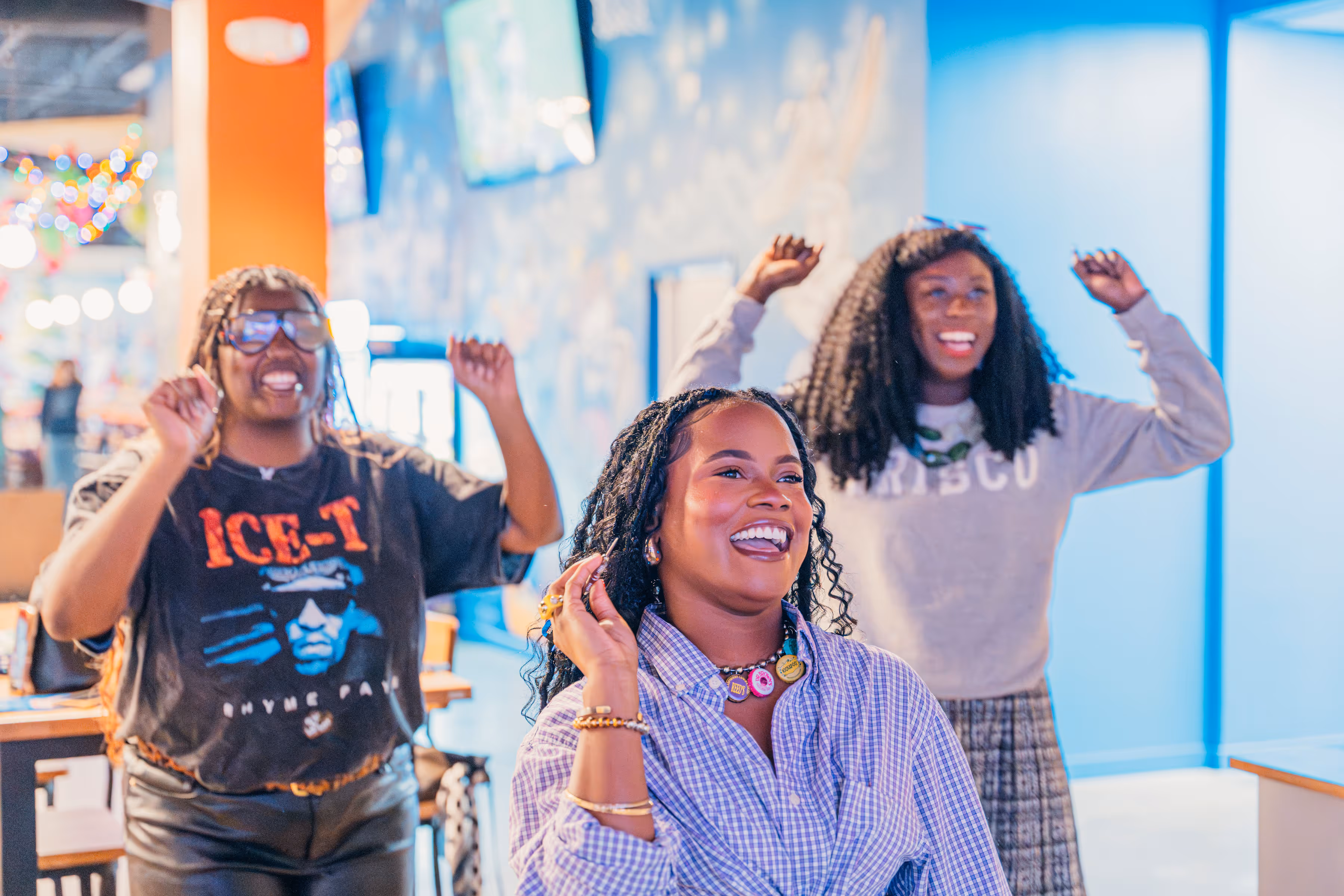 People playing darts