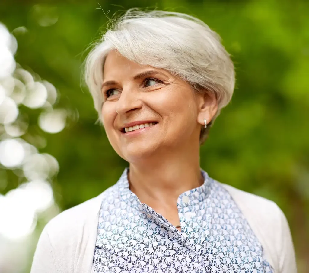 Smiling senior woman outdoors