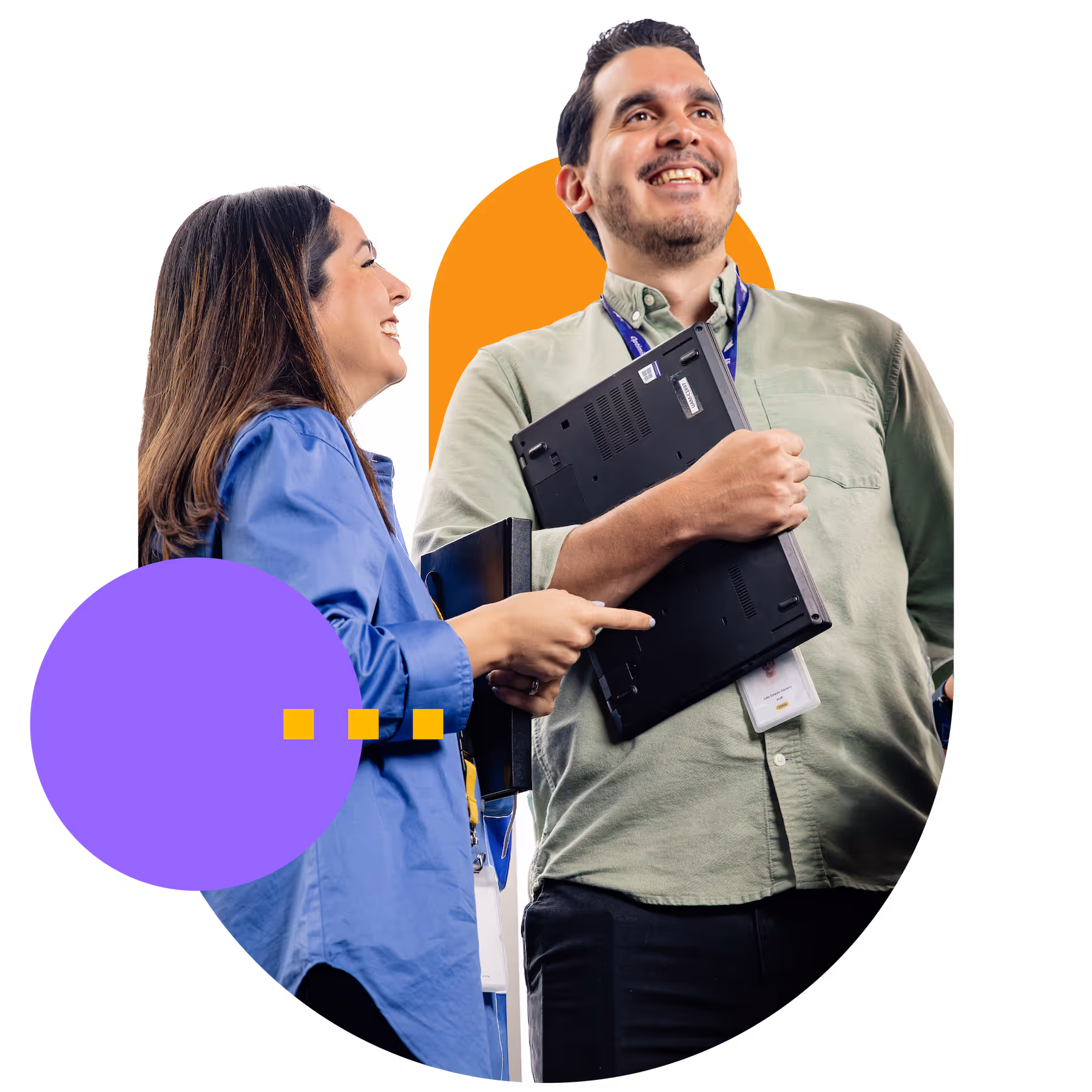 Two colleagues smiling and talking, one holding a laptop and the other pointing at it, with colorful graphic shapes in the background.