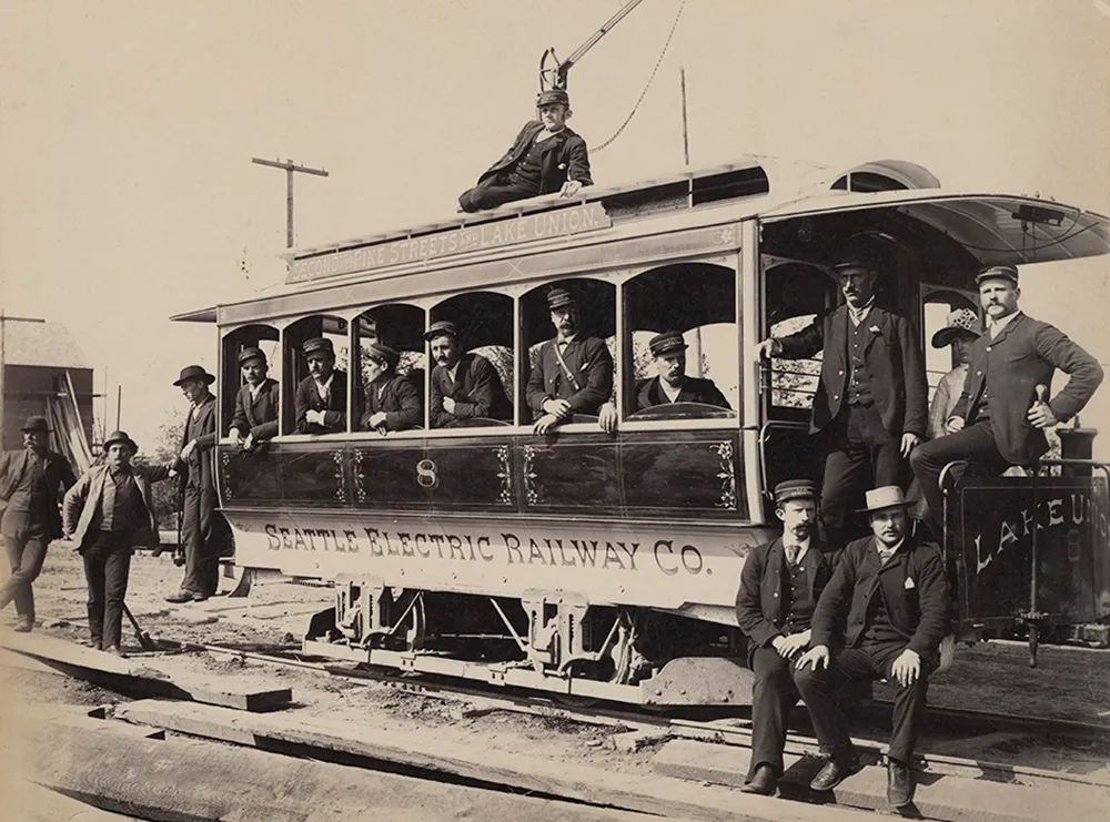 Seattle Electric Railway streetcar on opening day in 1884, with Mayor John Leary and guests aboard.