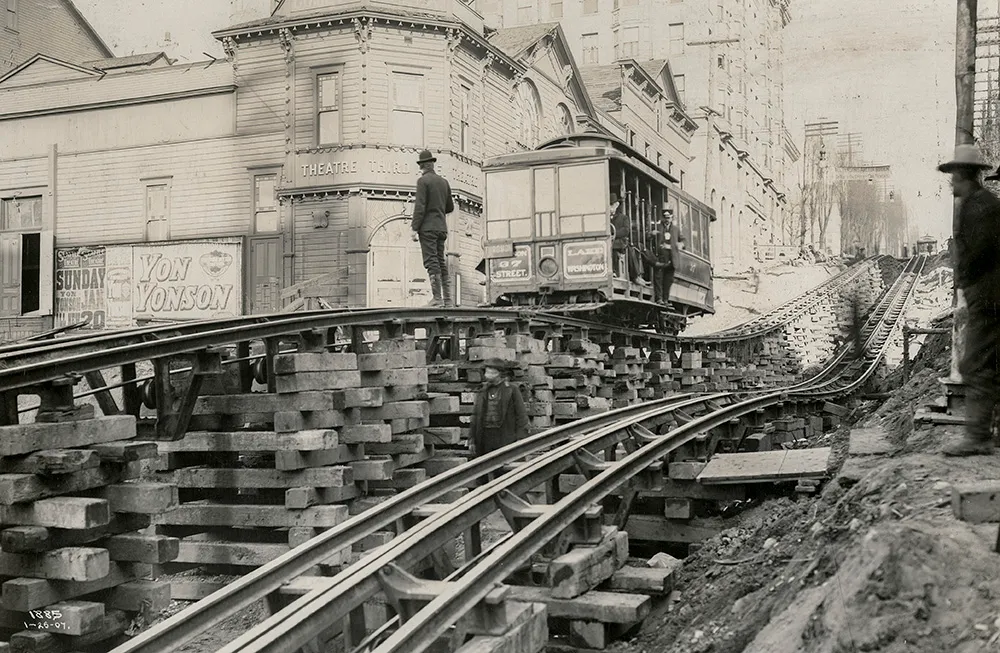 Cable car crosses a wooden trestle on Madison Street during Seattle’s Third Avenue regrade, circa 1907.